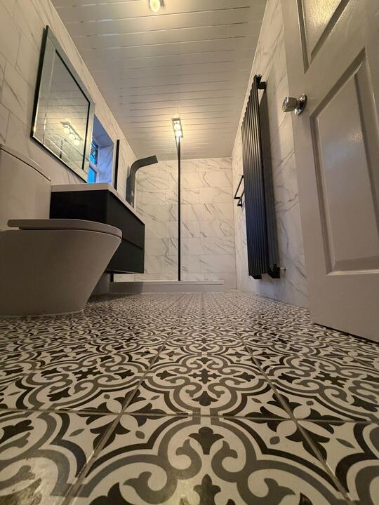 Bathroom Fitting by Romenzo Construction