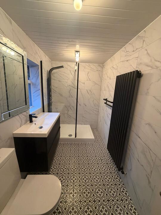 Bathrooms by Romenzo Construction