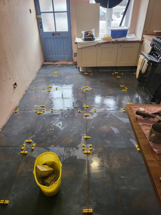 Tiling by Romenzo Construction