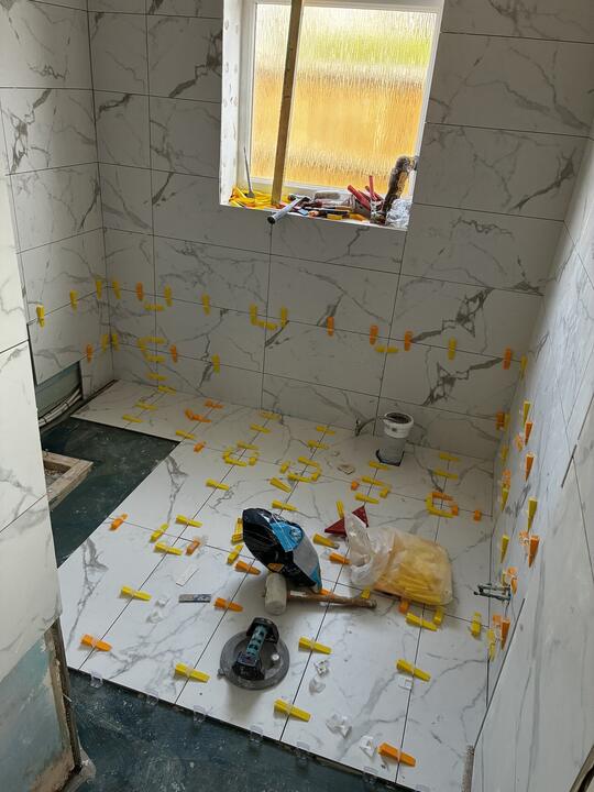 Tiling by Romenzo Construction