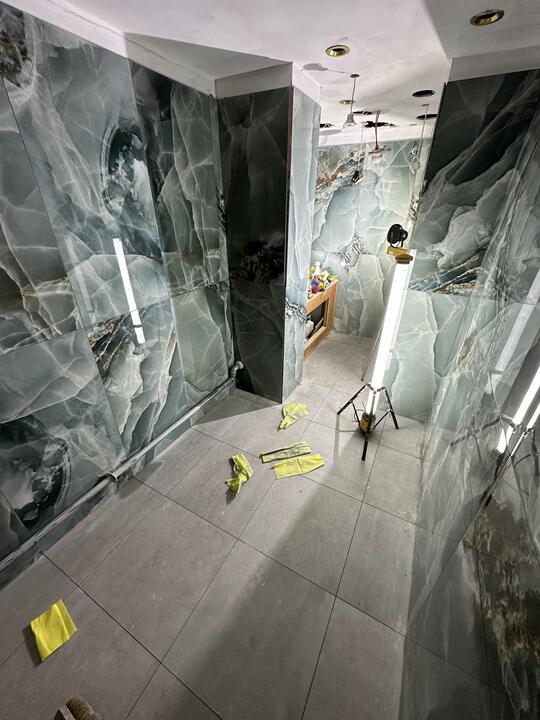 Tiling by Romenzo Construction