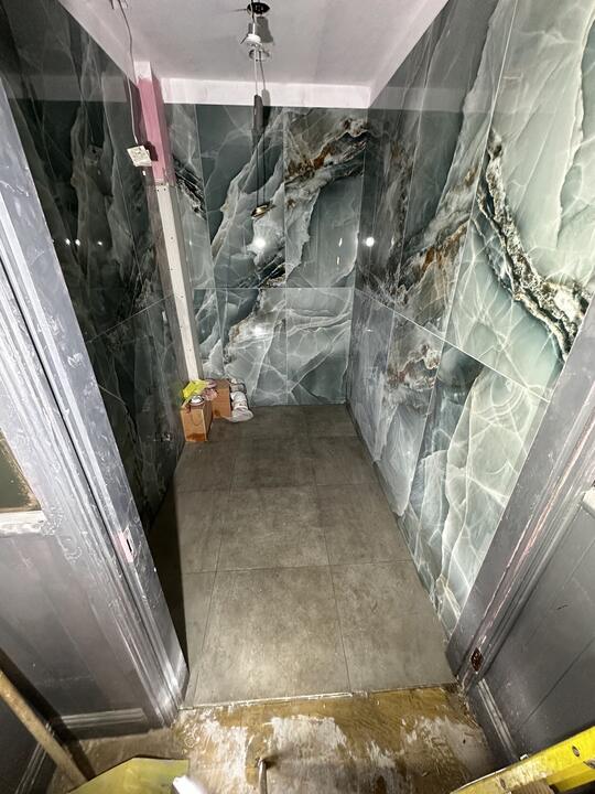 Tiling by Romenzo Construction
