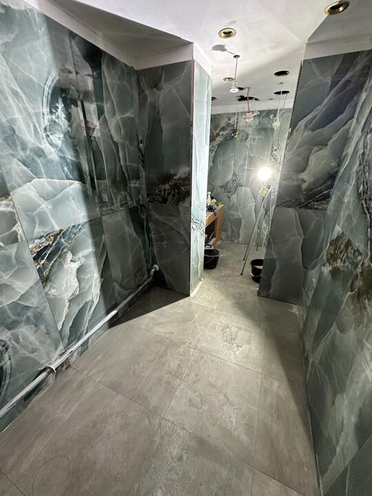 Tiling by Romenzo Construction