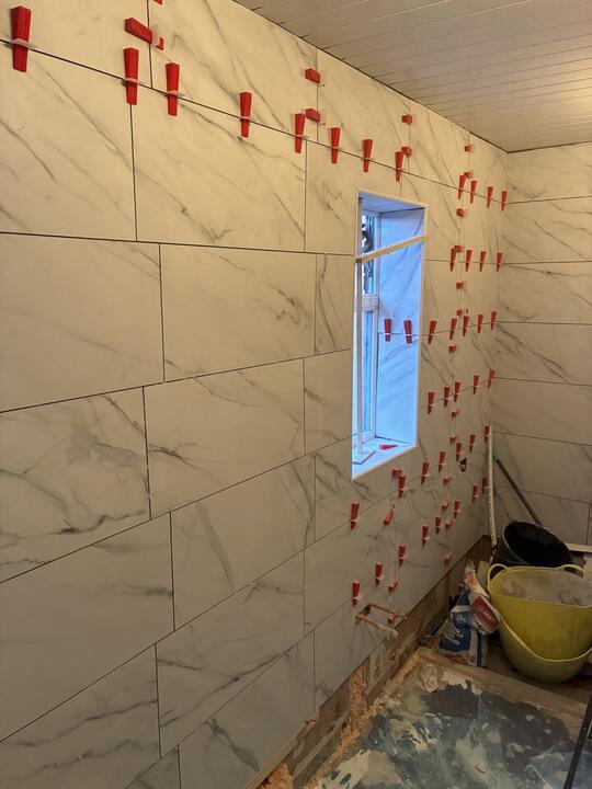Tiling by Romenzo Construction